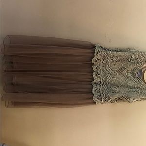 Sleeveless mini dress.